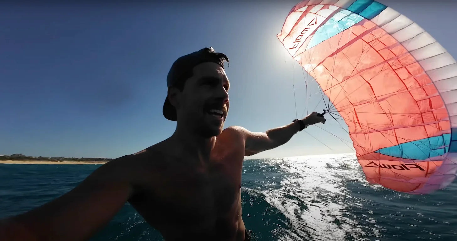 Dave West on the Amos Shapes Cypher Parawing Foil Board with chute out.