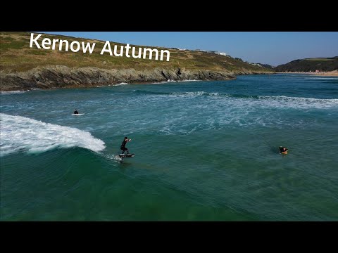 Team rider Tom Earl riding a black Amos Shapes Nano Prone surf carbon foilboard in ocean waves