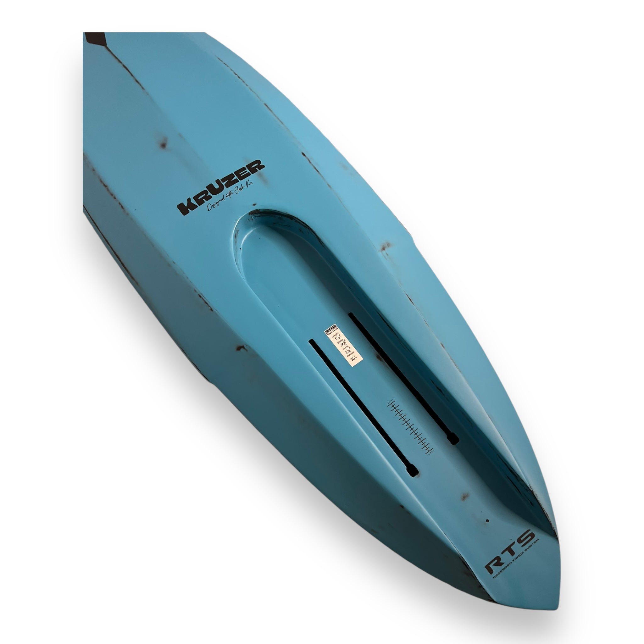 The tail of the Kruzer RTS Foil Drive board base in blue including the trench the foil drive goes in