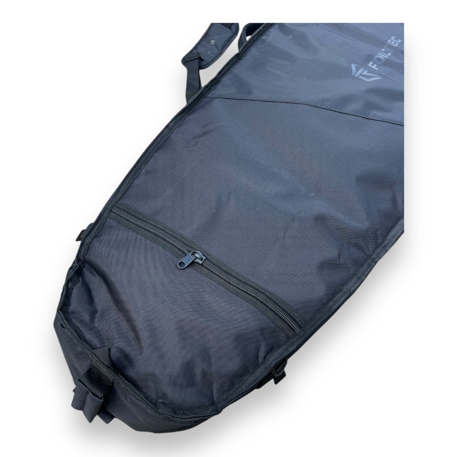 Top view of a black Foil Tec foilboard travel bag showing zipper and logo details