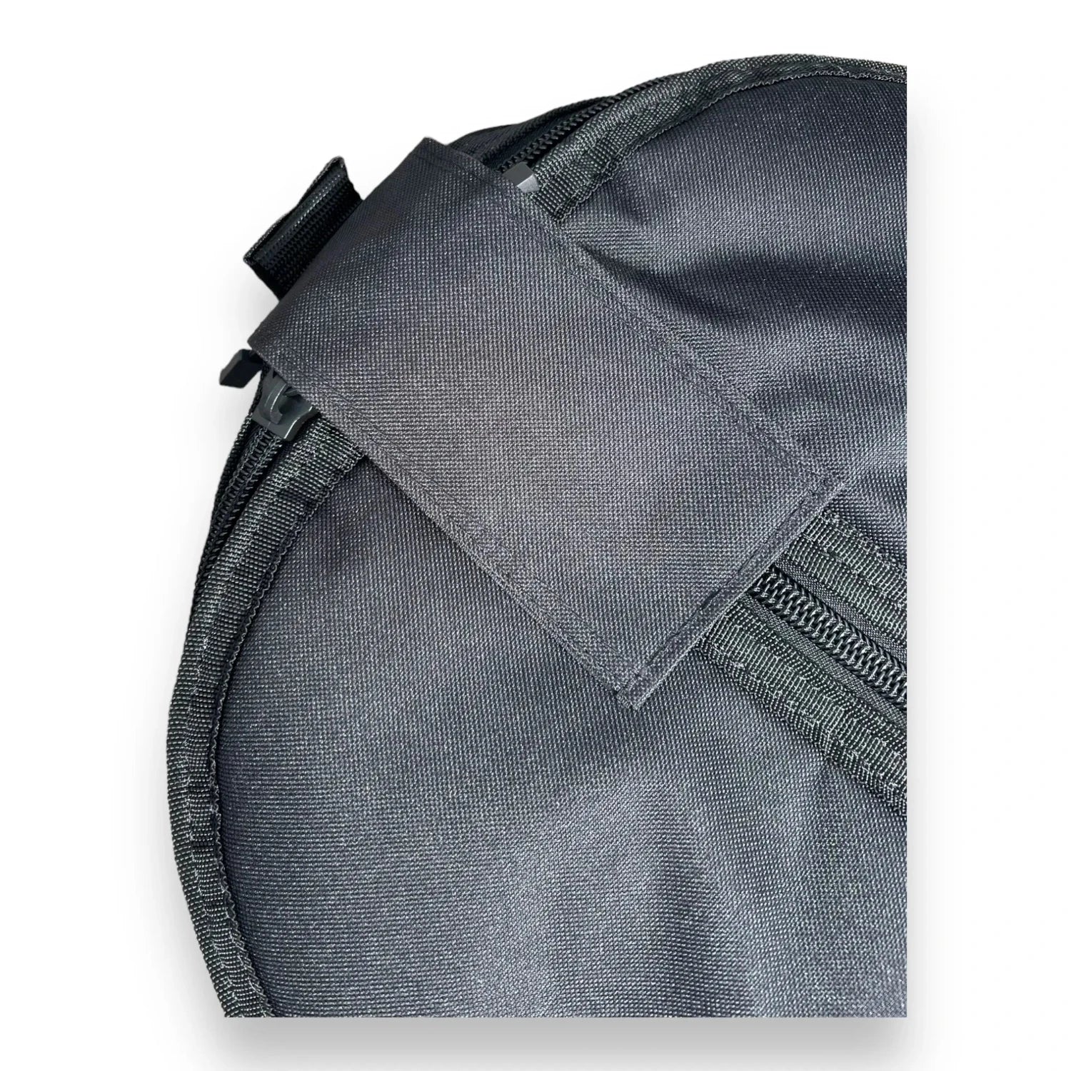 Detail shot of a velcro strap on a black Foil Tec foilboard travel bag