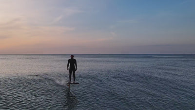 Team Rider Tom Earl riding the Nano RTS with Foil Drive set up in the sunset